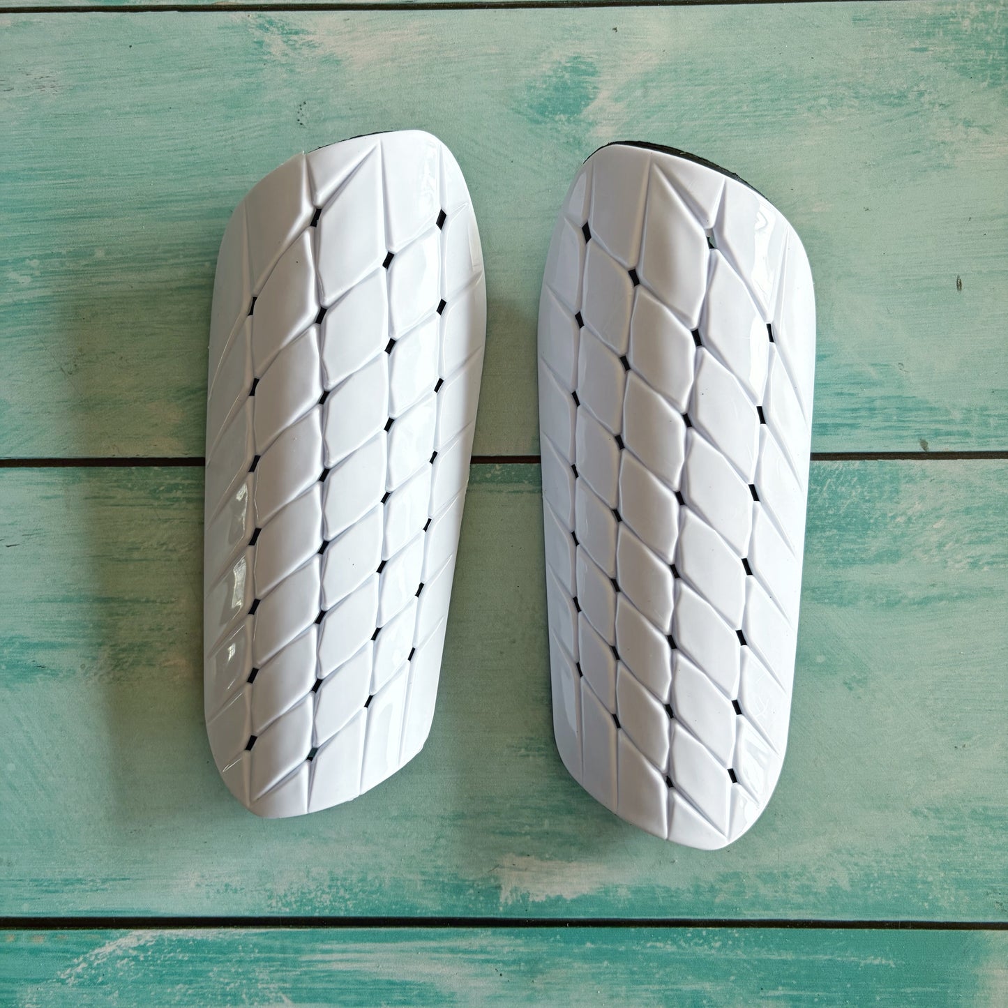 Canilleras de fútbol adulto sin velcro diseño rombos